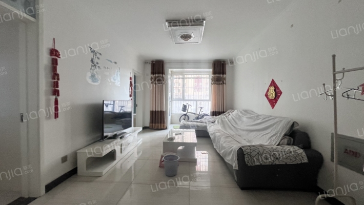 范阳路沿线 中装朝南两居室 出行方便 次新电梯房-客厅