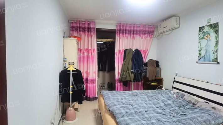 业主诚心出售，南北通透户型，集中供暖，交通方便-卧室A