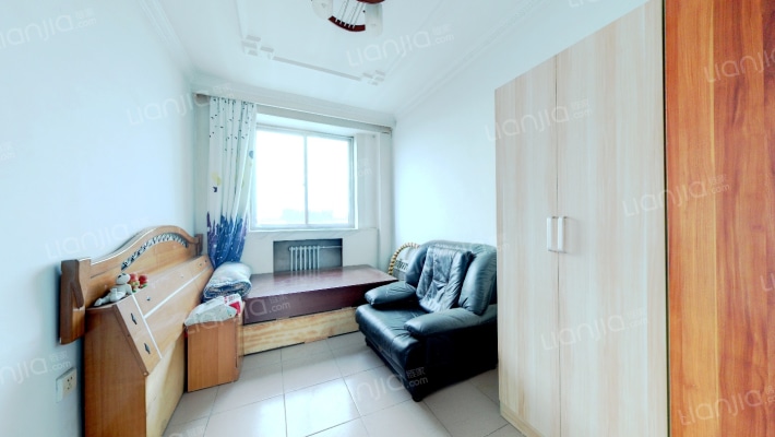 出售金正小区开发区集中供暖三居室-卧室B