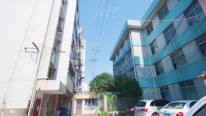 物资局办公楼后西住宅楼外景图